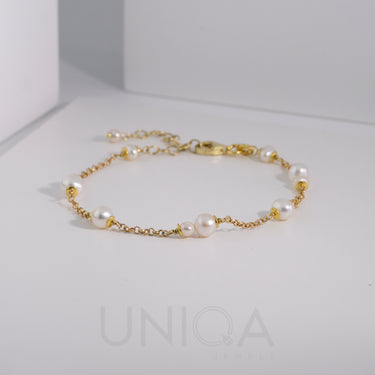 Bracciale con perle e catenina