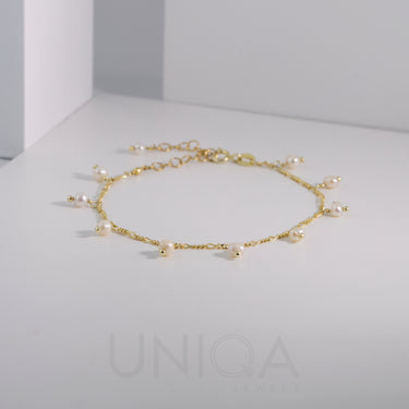 Bracciale con charm di perle 